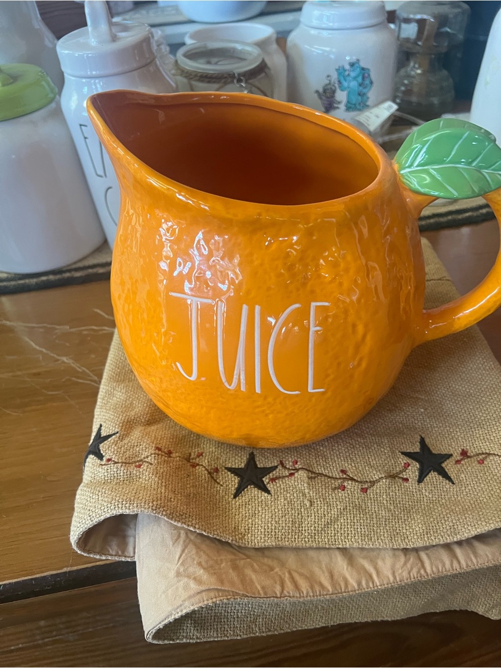 Rae Dunn Orange Ceramic Pitcher with Leaf Accent